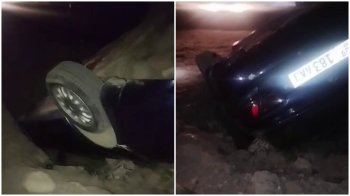 В Караколе автомобиль провалился в яму. Позже мэрия яму забетонировала (обновлено)