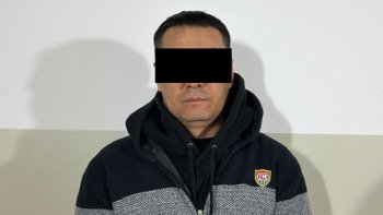 Задержанный подозреваемый. Фото ГКНБ КР.